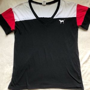 PINK small black, white, and red V-neck